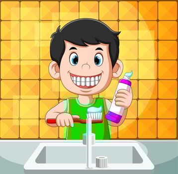 Boy is smiling and brushing his the with the toothpaste vector