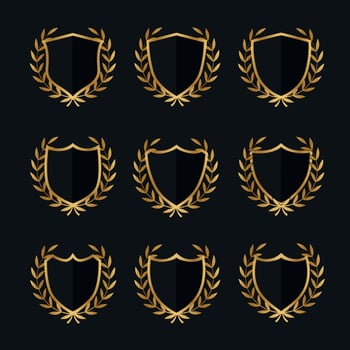 Set of shields with laurels in gold color vector