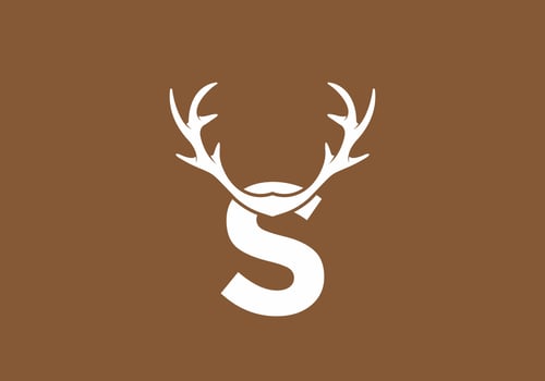White brown color of S initial letter with deer horn vector