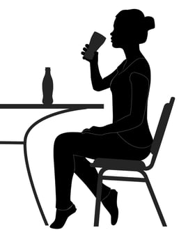 black silhouette of a girl drinking from a glass table vector