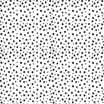 Vector seamless random small black polka dot pattern on white background. Irregular chaotic points. Simple modern decorative hand drawn print for design, textile, wrapping paper, scrapbooking.