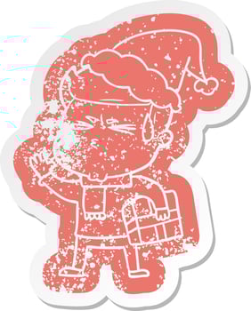 cartoon distressed sticker of a man sweating wearing santa hat vector