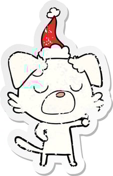 distressed sticker cartoon of a dog wearing santa hat vector