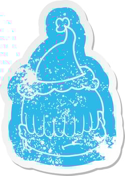 cartoon distressed sticker of a face with hair over eyes wearing santa hat vector