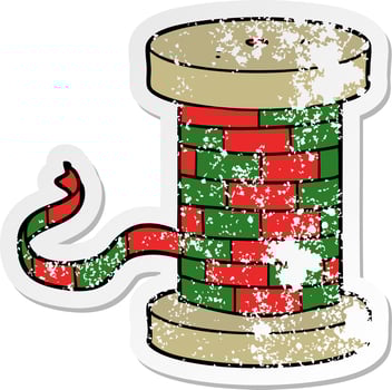 distressed sticker of a cartoon reel of ribbon vector