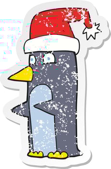 retro distressed sticker of a cartoon christmas penguin vector