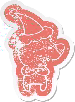 cartoon distressed sticker of a bear wearing santa hat vector