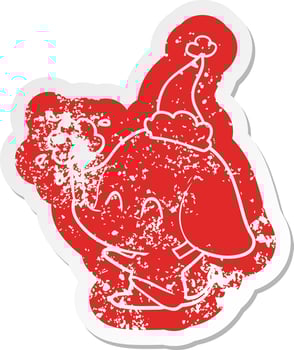 cute cartoon distressed sticker of a elephant spouting water wearing santa hat vector