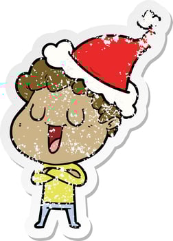 laughing distressed sticker cartoon of a man wearing santa hat vector