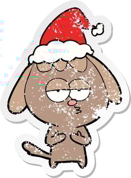distressed sticker cartoon of a bored dog wearing santa hat vector