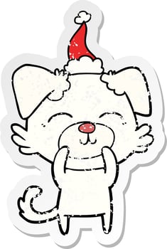 distressed sticker cartoon of a dog wearing santa hat vector