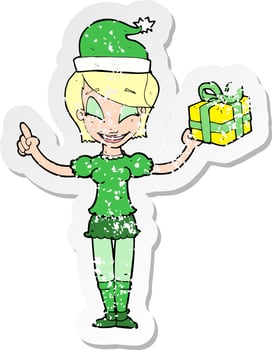 retro distressed sticker of a cartoon woman with christmas present vector