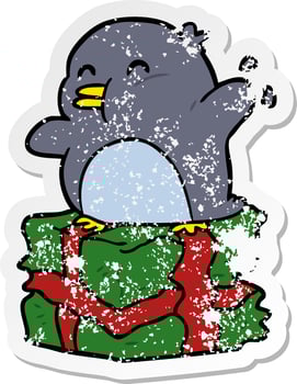 distressed sticker of a cartoon penguin on present vector