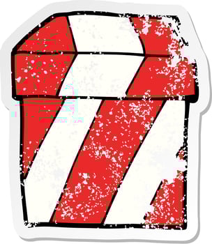 distressed sticker of a cartoon gift box vector
