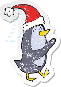 retro distressed sticker of a cartoon christmas penguin vector