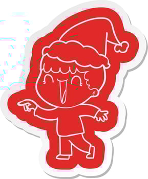 laughing cartoon  sticker of a man pointing wearing santa hat vector