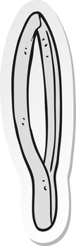 sticker of a cartoon tweezers vector