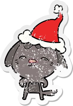 happy distressed sticker cartoon of a dog wearing santa hat vector