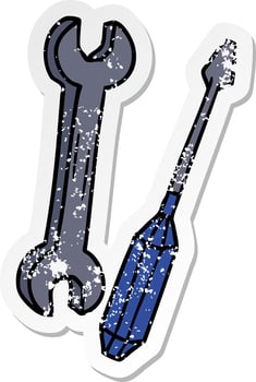 distressed sticker cartoon doodle of a spanner and a screwdriver vector