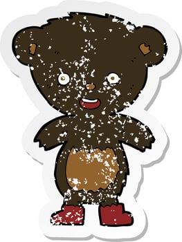 retro distressed sticker of a cartoon black bear cub vector
