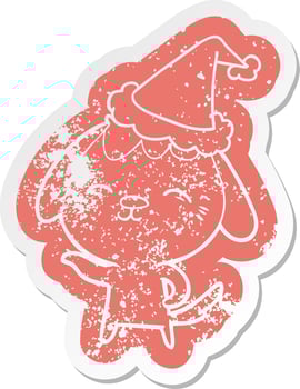 happy cartoon distressed sticker of a dog wearing santa hat vector