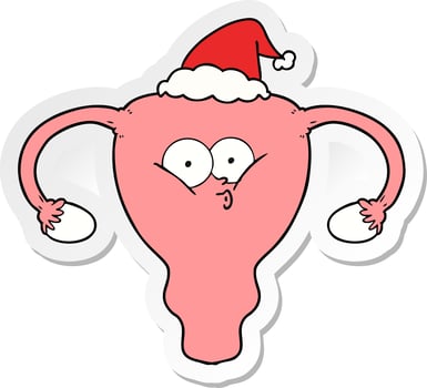 sticker cartoon of a uterus wearing santa hat vector