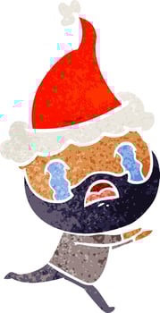retro cartoon of a bearded man crying wearing santa hat vector
