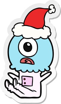 sticker cartoon of a cyclops alien spaceman wearing santa hat vector