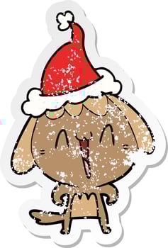 cute distressed sticker cartoon of a dog wearing santa hat vector