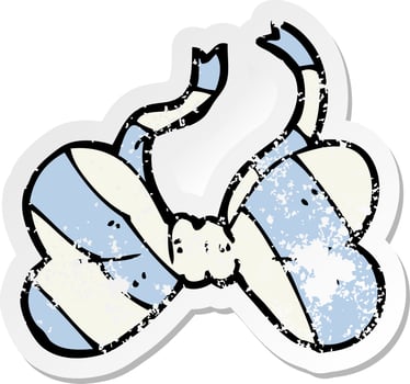 retro distressed sticker of a cartoon striped bow tie vector