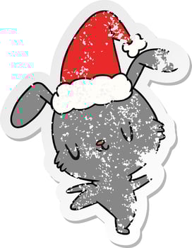 christmas distressed sticker cartoon of kawaii rabbit vector