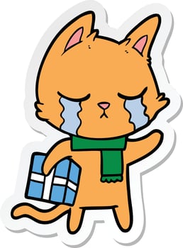 sticker of a crying cartoon cat holding christmas present vector