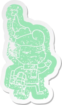 cartoon distressed sticker of a cool guy with fashion hair cut wearing santa hat vector