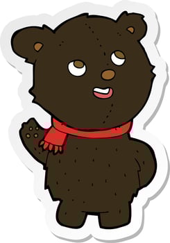 sticker of a cartoon cute black bear cub vector