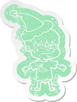 annoyed cartoon distressed sticker of a boy wearing santa hat vector