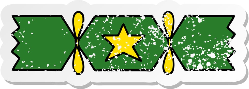 distressed sticker of a cute cartoon christmas cracker vector