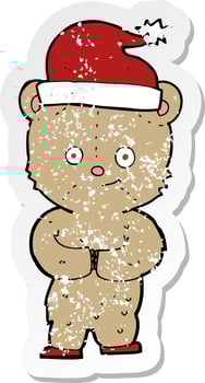 retro distressed sticker of a cartoon christmas teddy bear vector