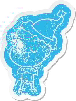 laughing cartoon distressed sticker of a man wearing santa hat vector