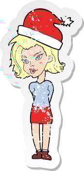 retro distressed sticker of a cartoon woman wearing christmas hat vector