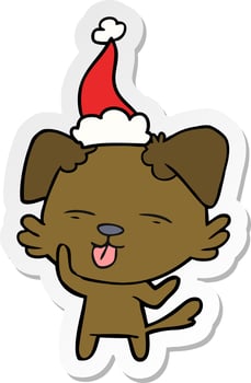 sticker cartoon of a dog sticking out tongue wearing santa hat vector