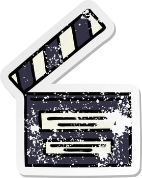 distressed sticker of a cute cartoon director clapper vector