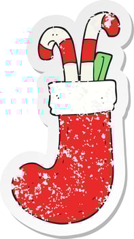 retro distressed sticker of a cartoon christmas stocking vector