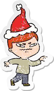 distressed sticker cartoon of a angry man pointing wearing santa hat vector
