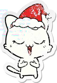 happy distressed sticker cartoon of a cat wearing santa hat vector