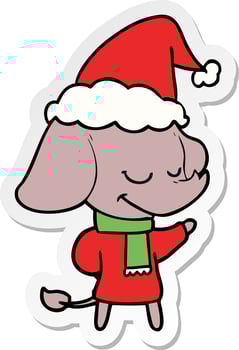 sticker cartoon of a smiling elephant wearing scarf wearing santa hat vector