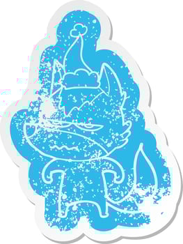 cartoon distressed sticker of a annoyed wolf wearing santa hat vector