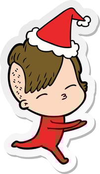 sticker cartoon of a girl in onesie wearing santa hat vector