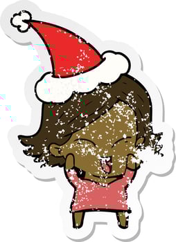 happy distressed sticker cartoon of a girl wearing santa hat vector