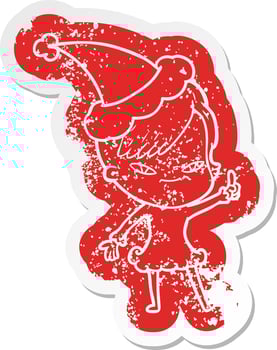 cute cartoon distressed sticker of a girl with hipster haircut wearing santa hat vector