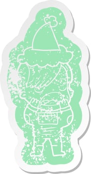 cartoon distressed sticker of a cool hipster girl in space suit wearing santa hat vector